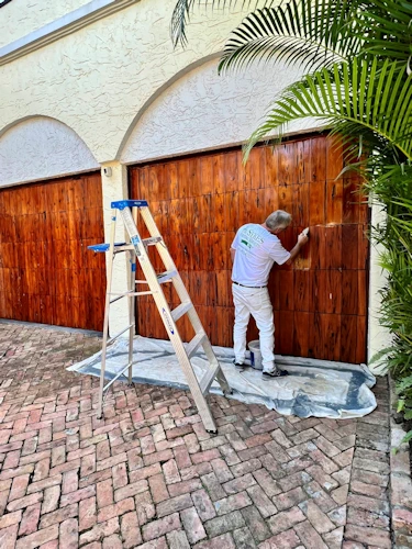 painting contractor Palm Beach before and after photo garage-door-staining-after